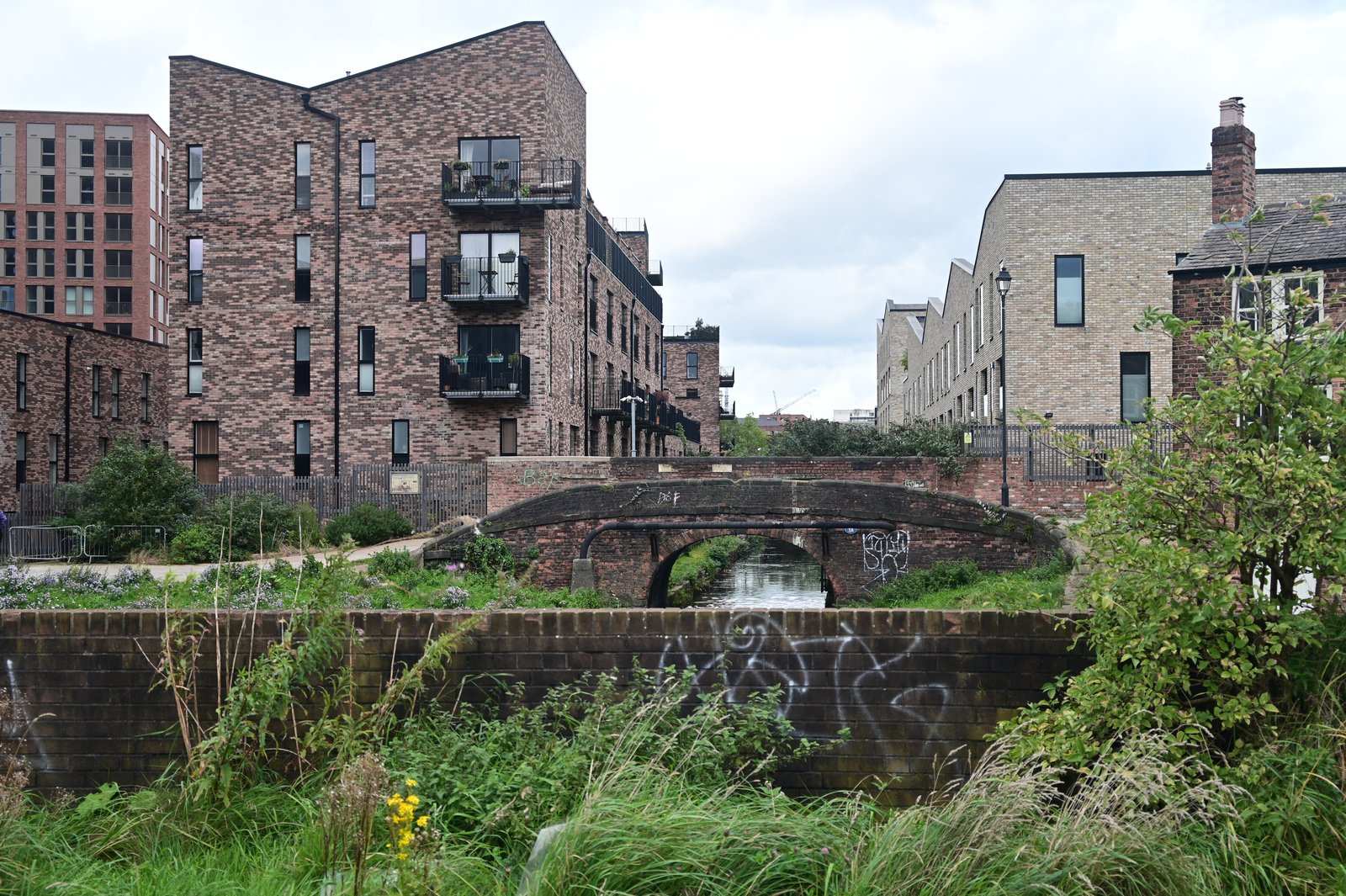 Old canal bridge among new housing